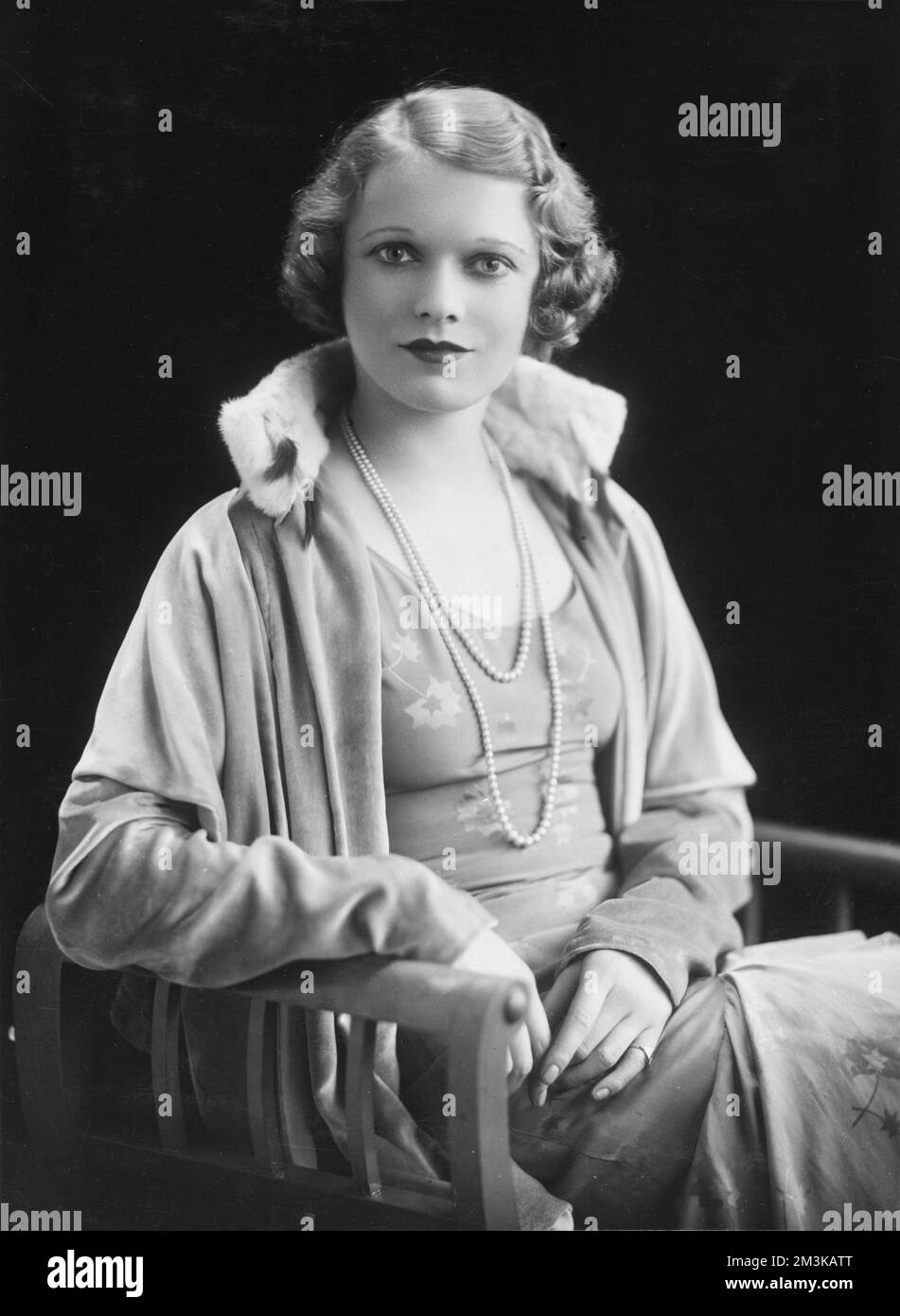 Photographic portrait of Dame Anna Neagle (1903 - 1986), born Flora Marjorie Robertson, British actress and film star.  Neagle soon became associated with the historical picture portraying Nell Gwynn and Queen Victoria on the silver screen.    c.1932 Stock Photo