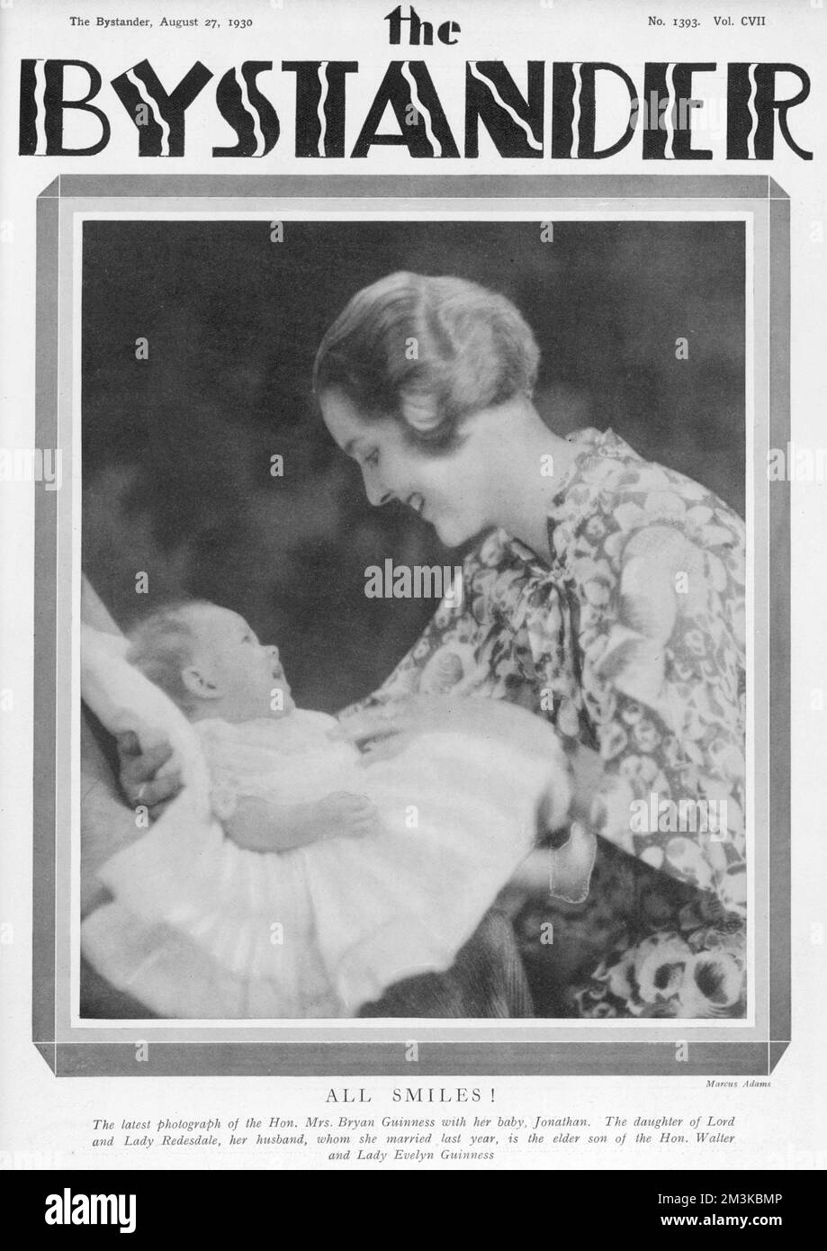 Mrs Bryan Guinness, aka Diana Freeman Mitford, later Mosley (1910 - 2003), pictured with her eldest son, Jonathan on the front cover of The Bystander magazine.  Diana Mitford was one of the six infamous sisters, daughters of Lord and Lady Redesdale. She married into the wealthy Guinness family at the age of 19 in 1929, but began a love affair with Sir Oswald Moseley, leader of the British Union of Fascists ('Blackshirts')in the 1930's. During the Second World War, she and Moseley were imprisoned as Nazi sympathisers.     Date: 1930 Stock Photo
