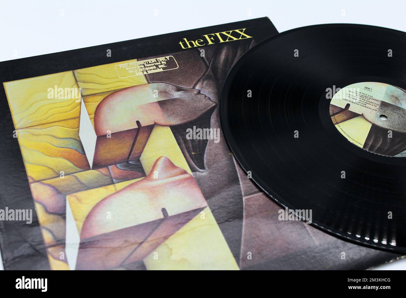 Phantoms is the third studio album by English new wave band the Fixx  on vinyl record LP disc. Album cover. Stock Photo