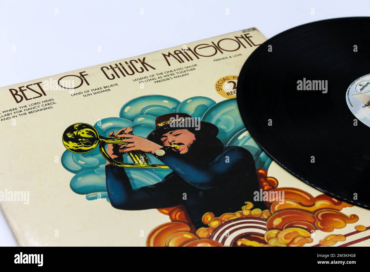 Charles Frank Mangione is an American flugelhorn player, voice actor, trumpeter and composer. Record LP disc titled The Best of Chuck Mangione. Album Stock Photo
