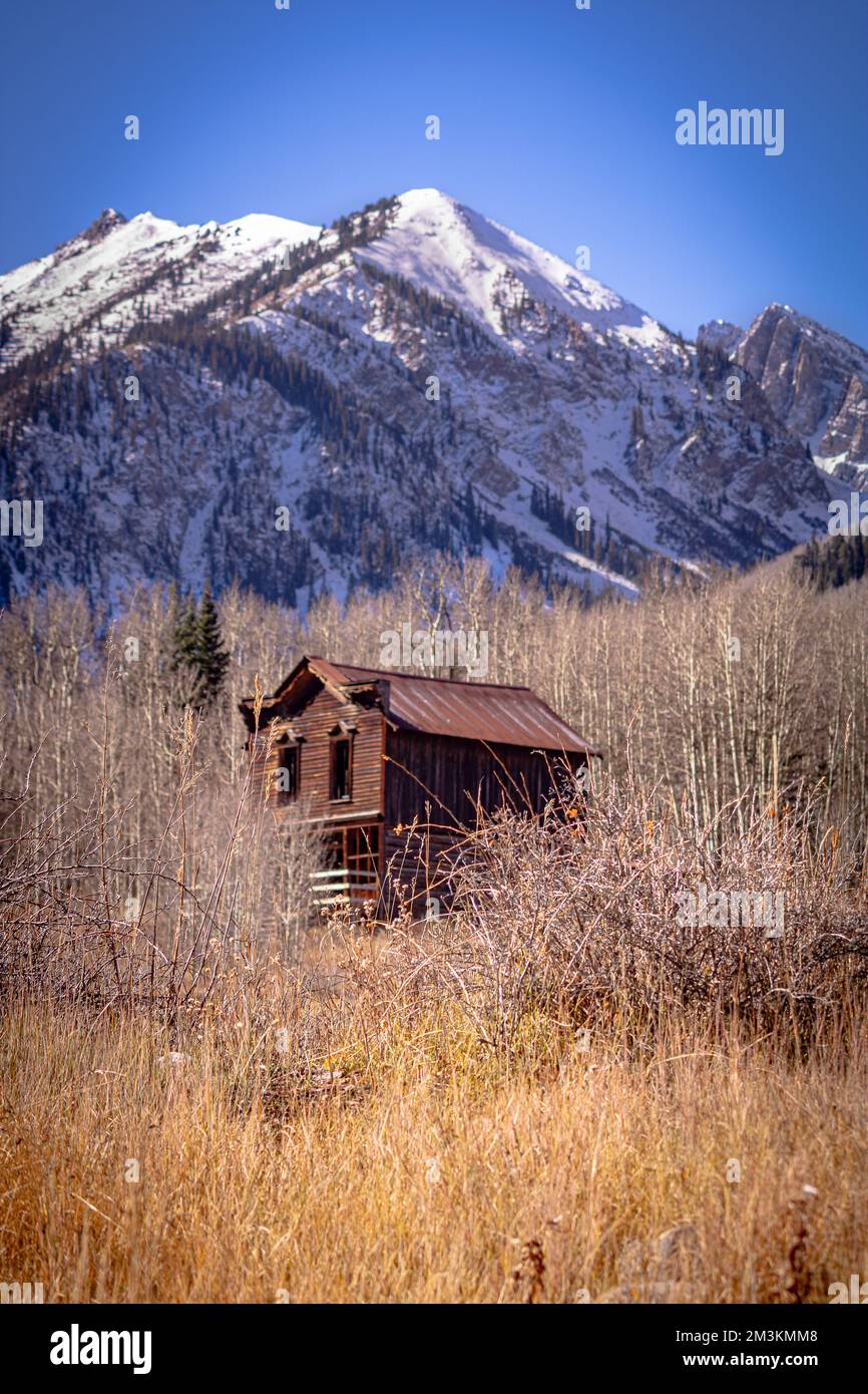Sitting desolate near Aspen, Colorado one can find an old western ghost town, Ashcroft.  The grasslands surrounding the peaks are lonely yet stoic. Stock Photo