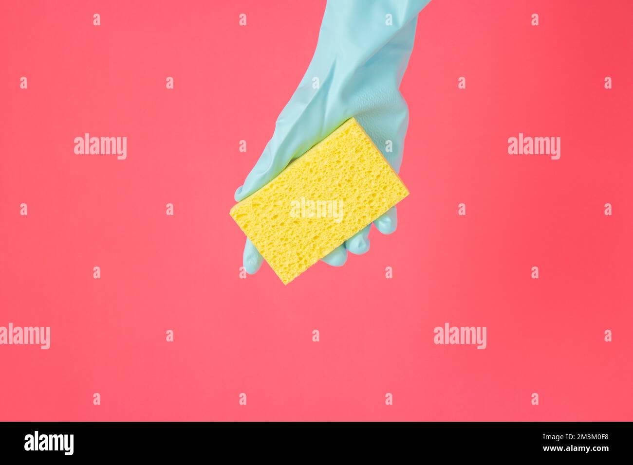 Cleaner concept, Hand in rubber gloves and holding yellow sponge for ...
