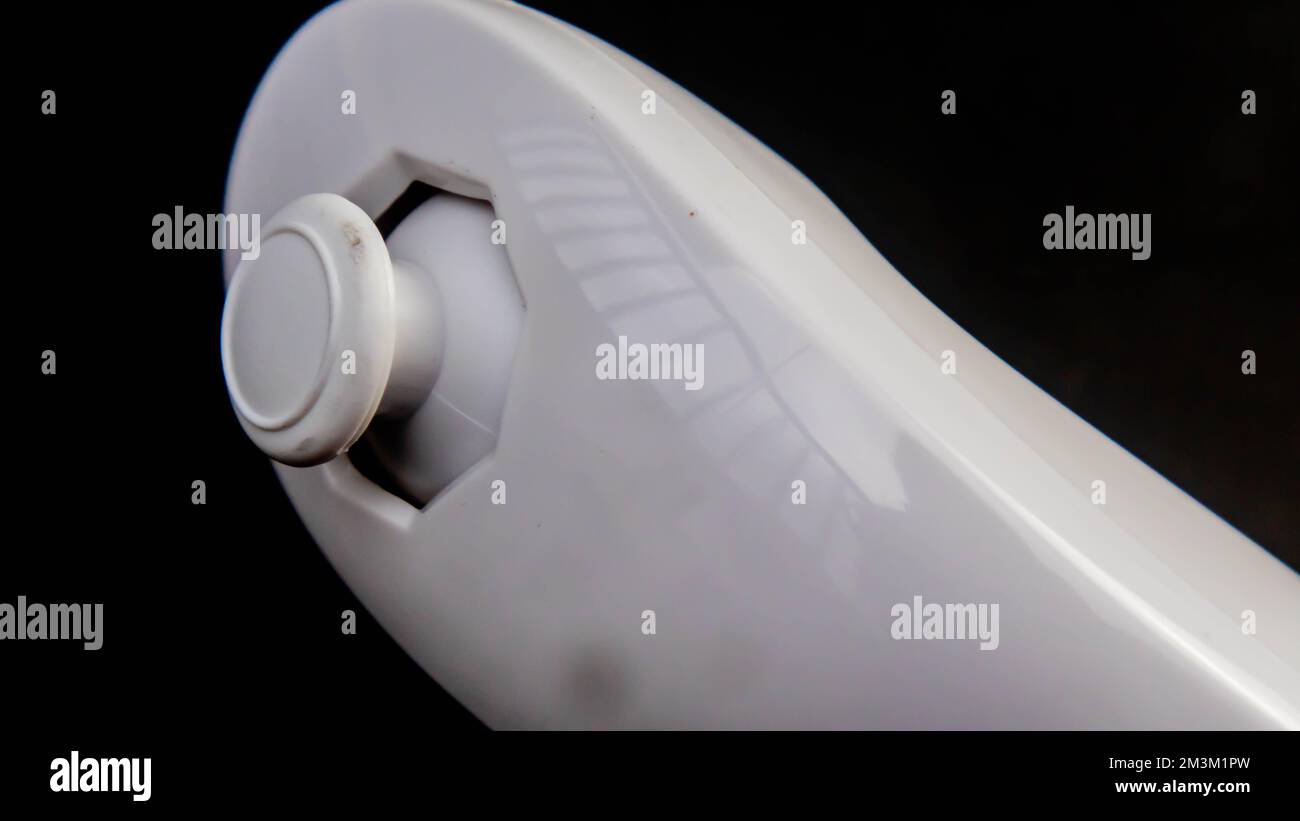 white joystick isolated on black background Stock Photo - Alamy