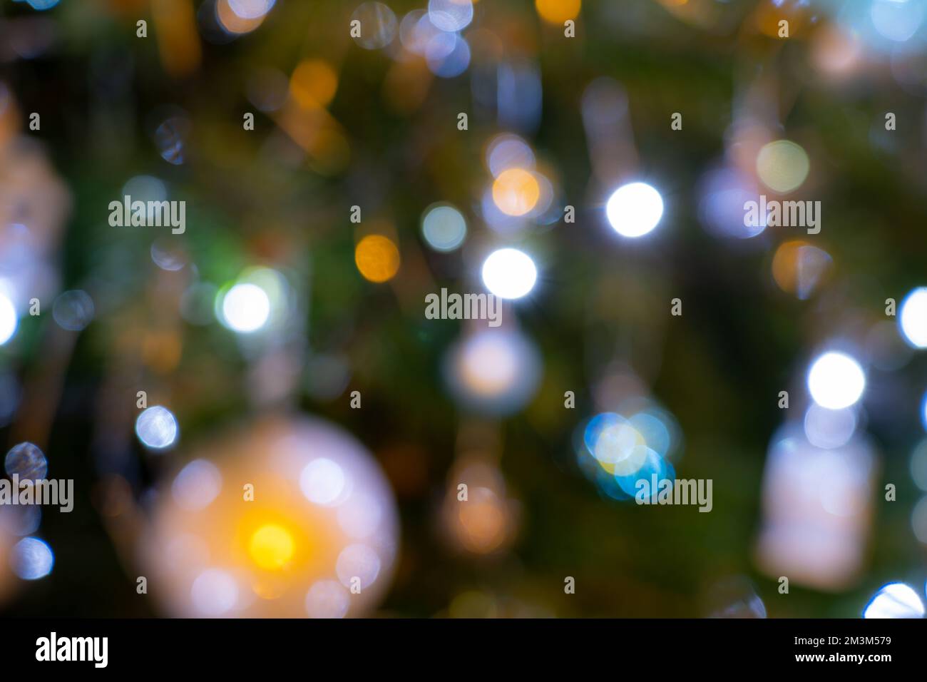 Out of focus Christmas tree lights and decorations Christmas background concept Stock Photo