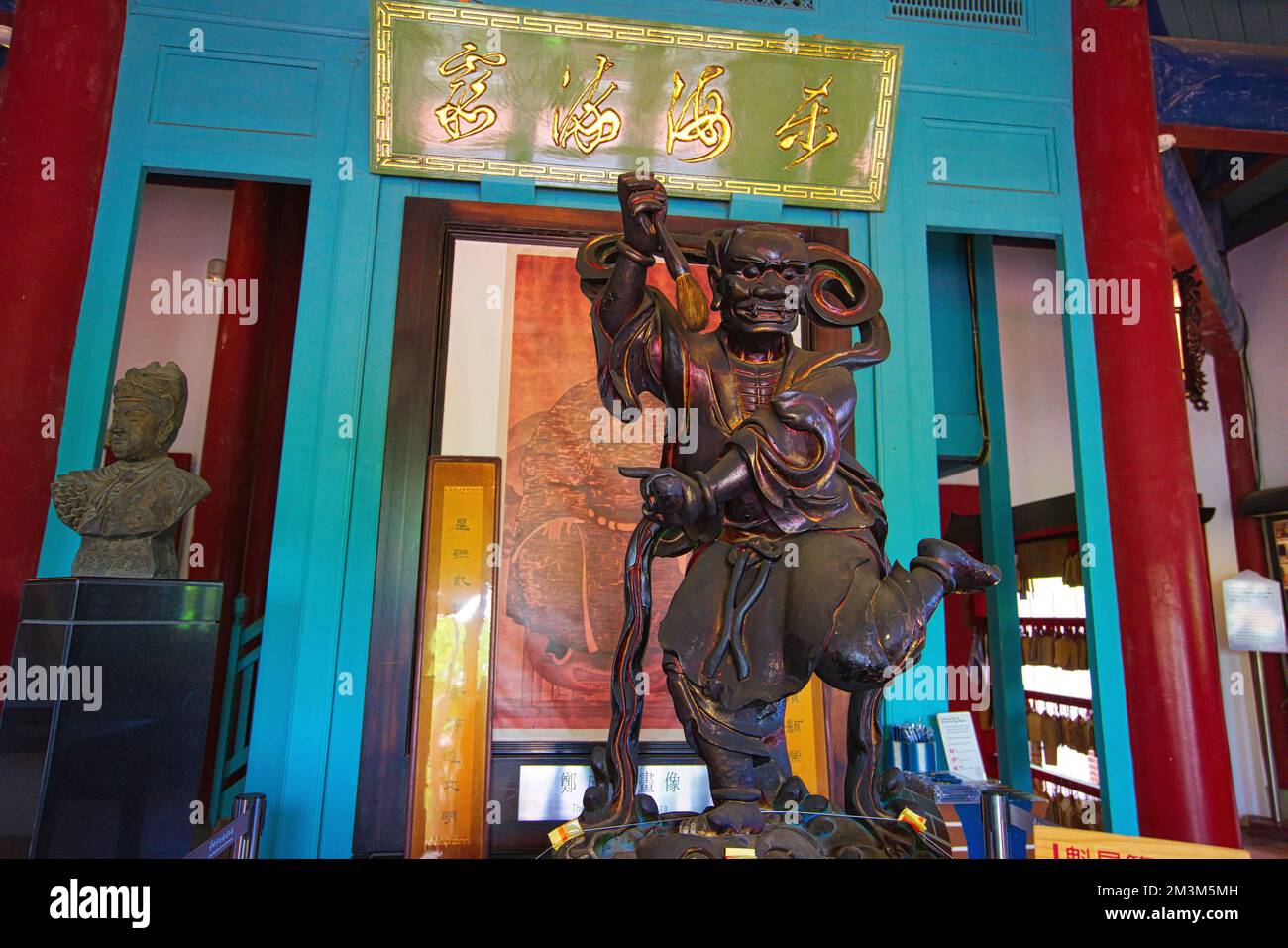 Woodcut memorial statue. Chikanlou is built by the Dutch in 1653. 'The sunset in Chikanlou ' was one of the eight famous scenic spots in Taiwan. Stock Photo