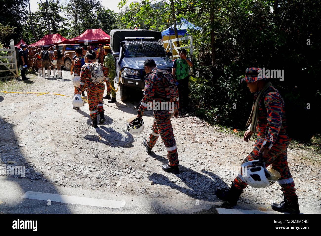 Rescue crews arrive to aid in search for victims of the landslide in Batang Kali, Selangor state, Malaysia December 16, 2022. REUTERS/Lai Seng Sin Stock Photo