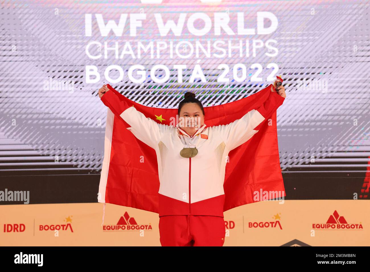 Bogota, Colombia. 15th Dec, 2022. Li Wenwen of China poses during the awarding ceremony of the womens 87kg event at the 2022 World Weightlifting Championships in Bogota, Colombia, Dec