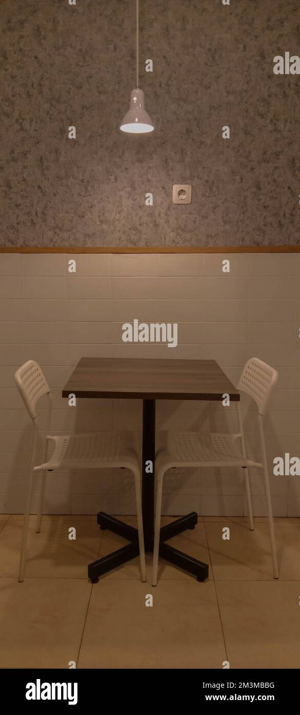 Dining table and chairs for two people, romantic Stock Photo - Alamy