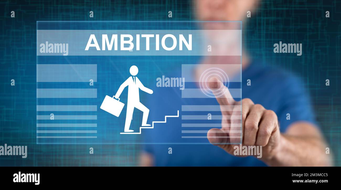 Man touching an ambition concept on a touch screen with his finger ...