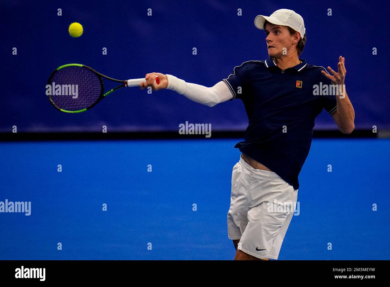 AMSTELVEEN, NETHERLANDS - DECEMBER 14: Alec Deckers plays a forehand in ...