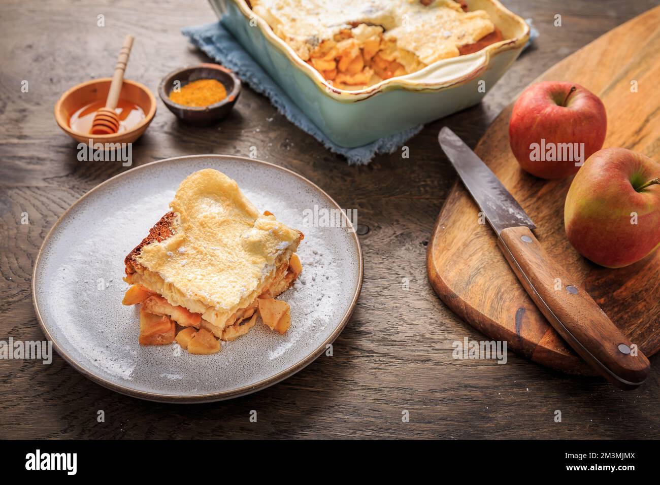 Homemade bread pudding breakfast casserole with apples and cinnamon and