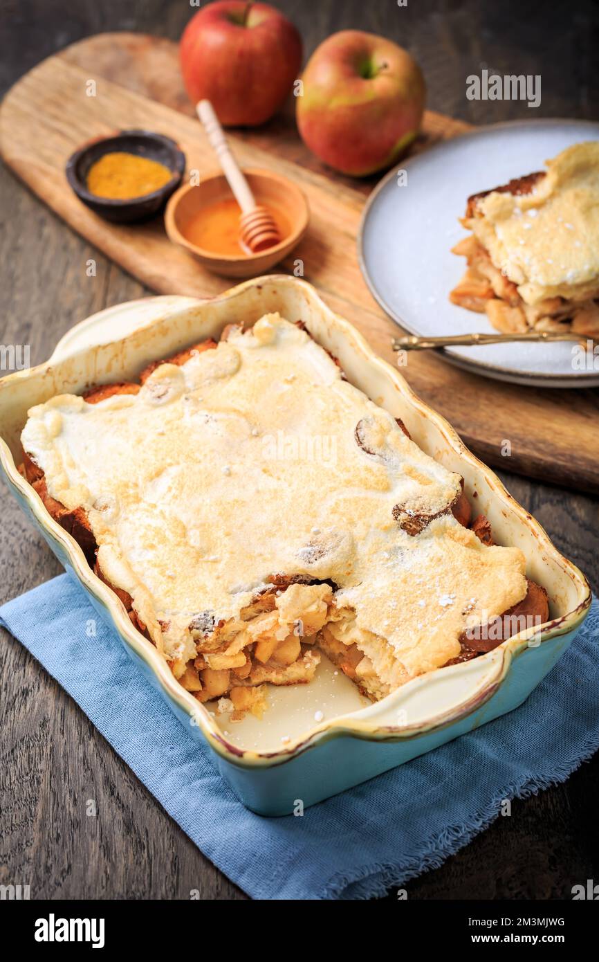 Homemade bread pudding breakfast casserole with apples and cinnamon and