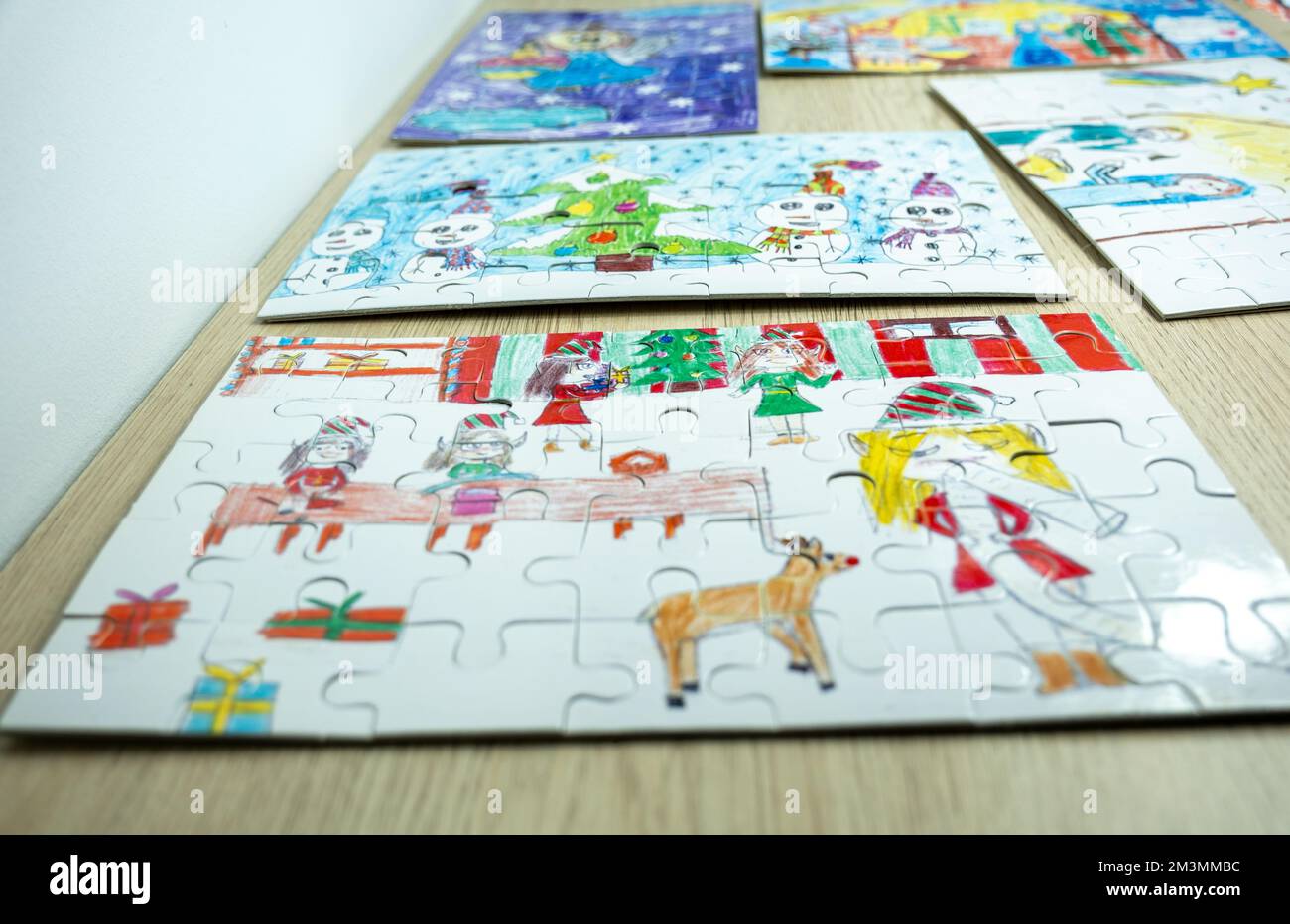 Elves are preparing gifts and a snowman - sublimation puzzle Stock Photo