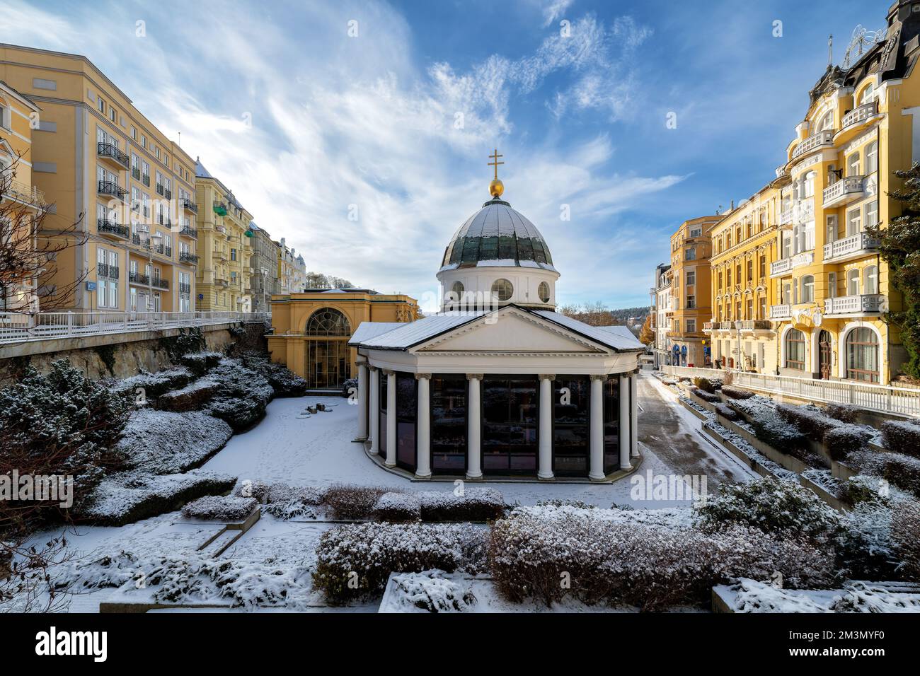 Pavilion of mineral water spring in winter with snow - Czech spa town Marianske Lazne (Marienbad) - Czech Republic - Stock Image