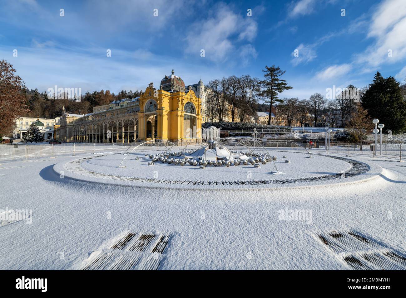 Neo-Baroque Main Colonnade in small west Bohemian Spa town Marianske Lazne (Marienbad) - sunny winter day with snow - region Karlovy Vary - Czechia - Stock Image