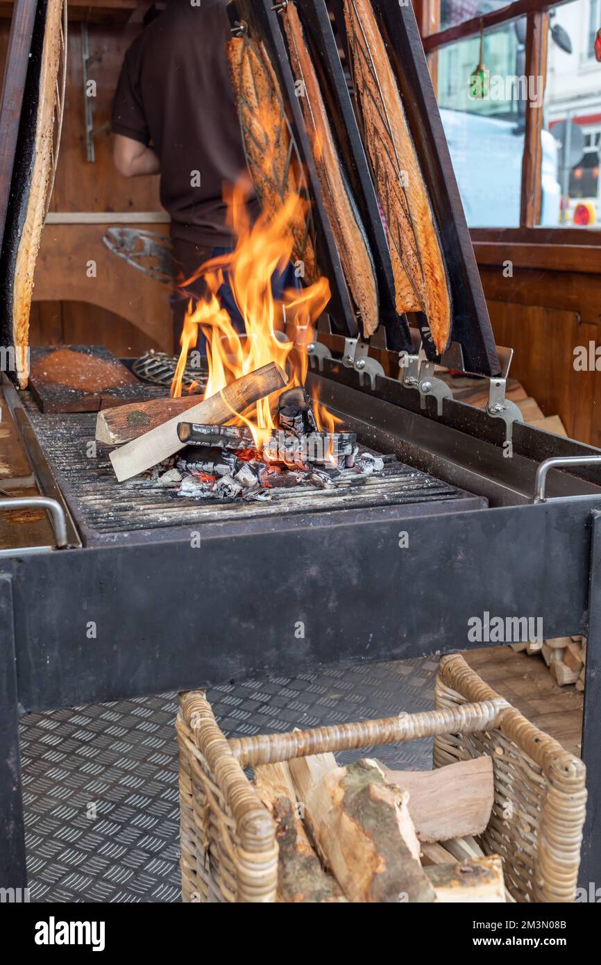 salmon sides are grilled over an open fire Stock Photo Alamy