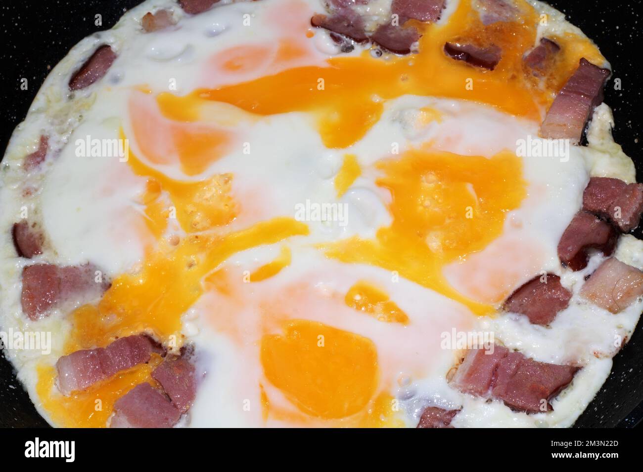 photo fried eggs with a slice of bacon Stock Photo