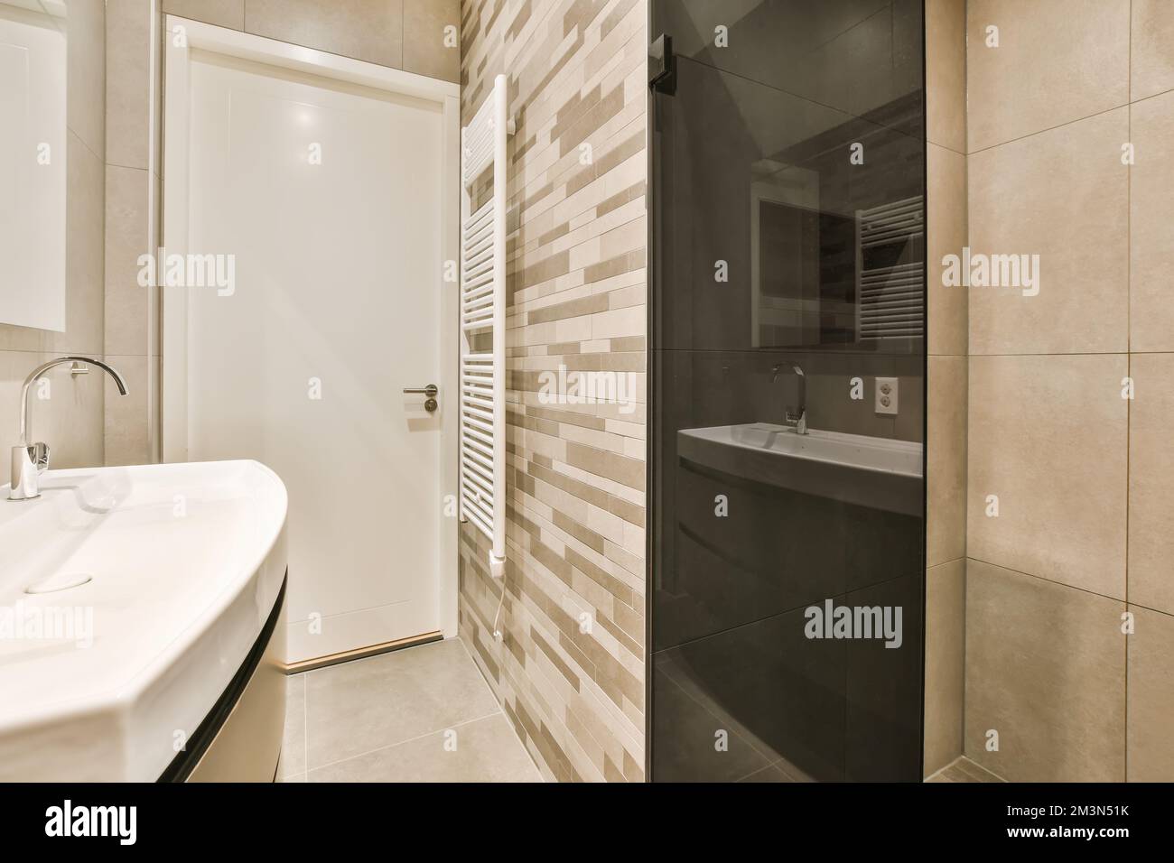 a bathroom that is very clean and ready to use as a shower stall or room divider for the toilet Stock Photo