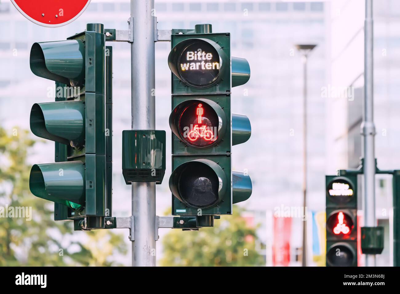 Red forbidding traffic light for pedestrians and cyclists and the