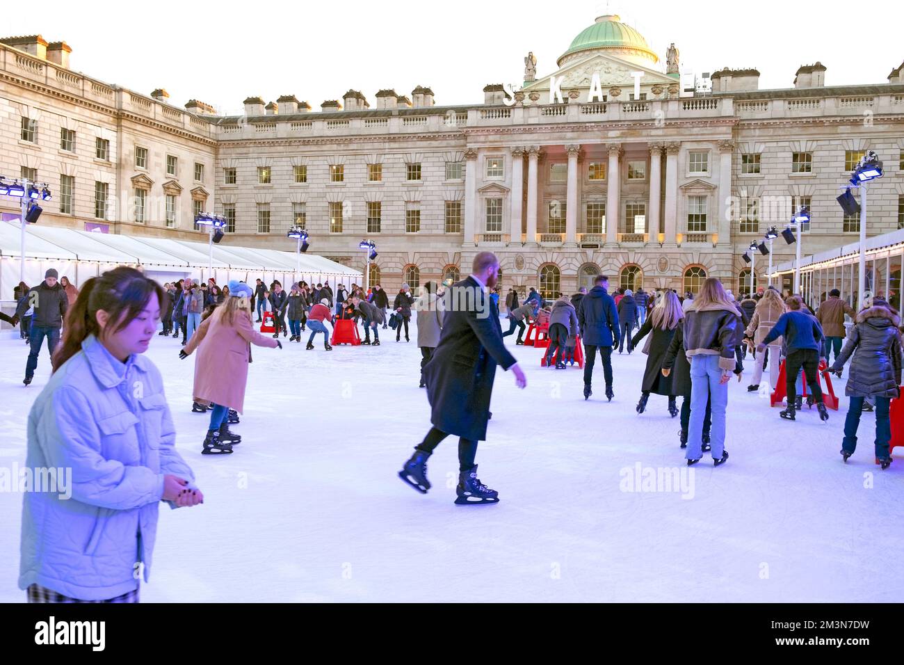 Ice skaters people ice skating on the public rink outside Somerset