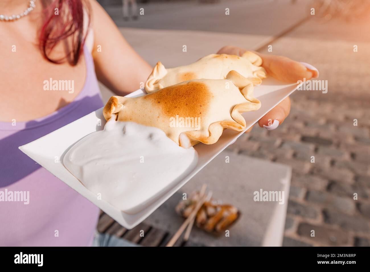 Delicious pies with empanadas filling are popular in Spain and Argentina. Street food and fastfood concept Stock Photo