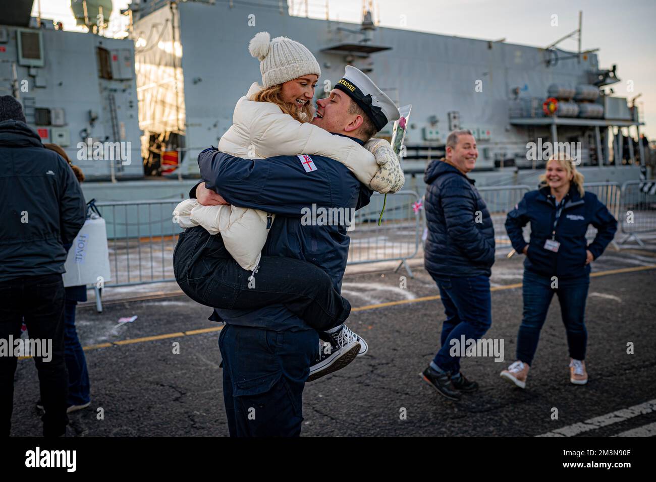 A Couple Hug As Families And Loved Ones Greet The Return Of Hms