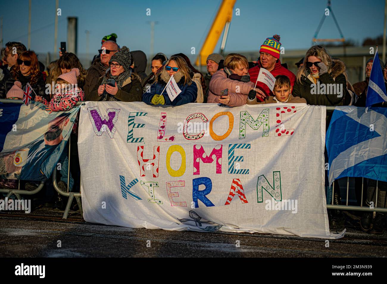 A Sailor Gets Hugs As Families And Loved Ones Greet The Return Of Hms