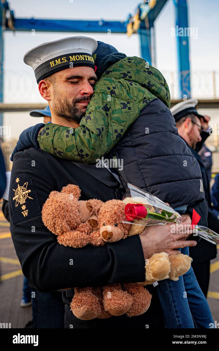 A Sailor Gets Emotional As Families And Loved Ones Greet The Return Of