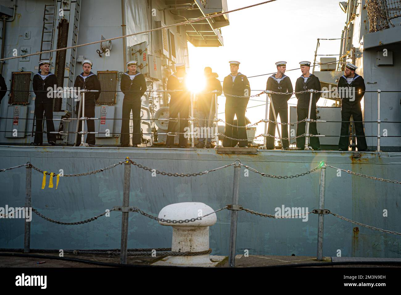 Sailors Watch The Crowds From The Ship S Deck As Families And Loved