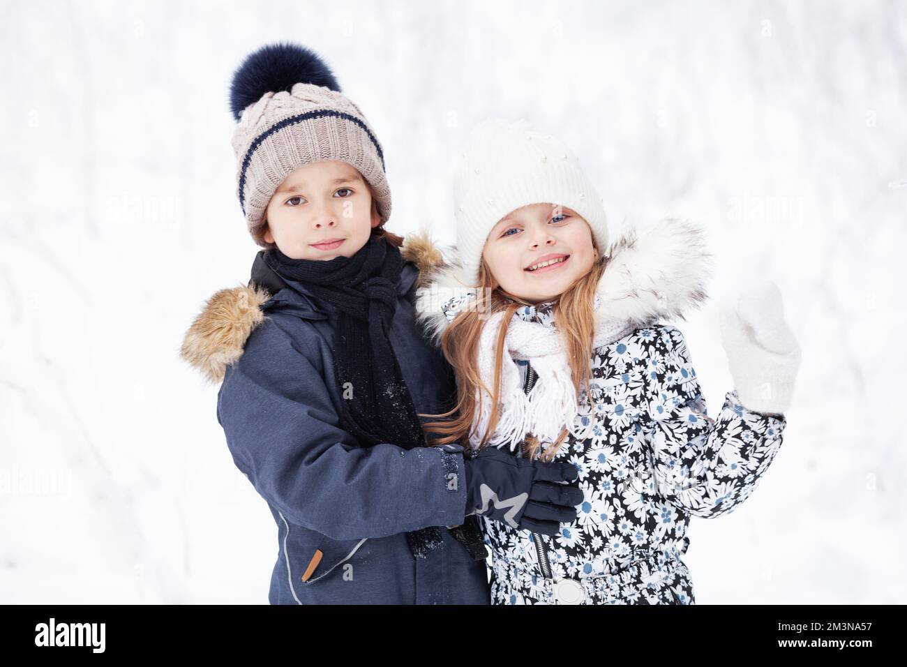 Children Wearing Snow Clothes In Winter High-Res Stock Photo