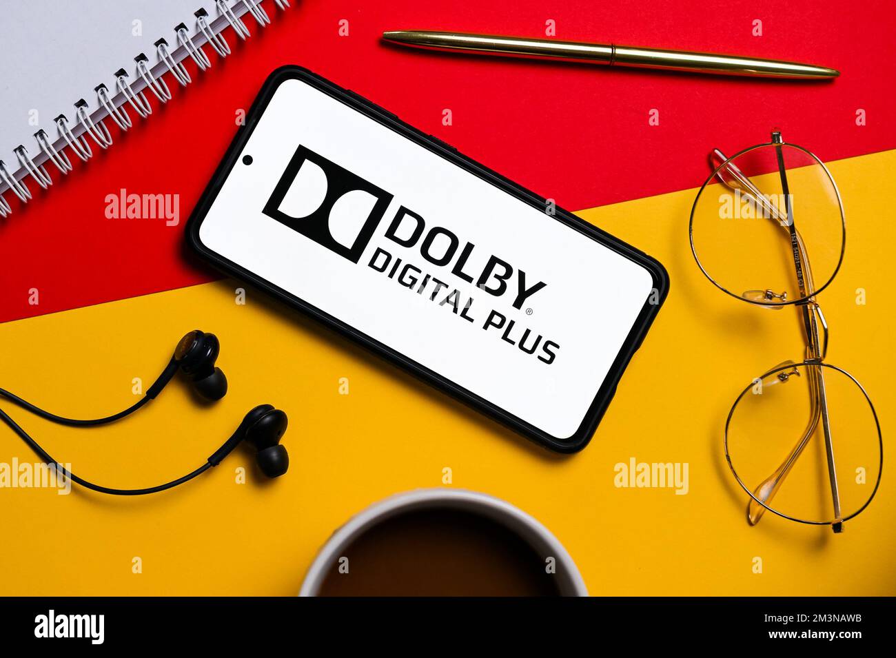 In this photo illustration a Dolby Digital Plus logo seen displayed on a smartphone. (Photo by Mateusz Slodkowski / SOPA Images/Sipa USA) Stock Photo