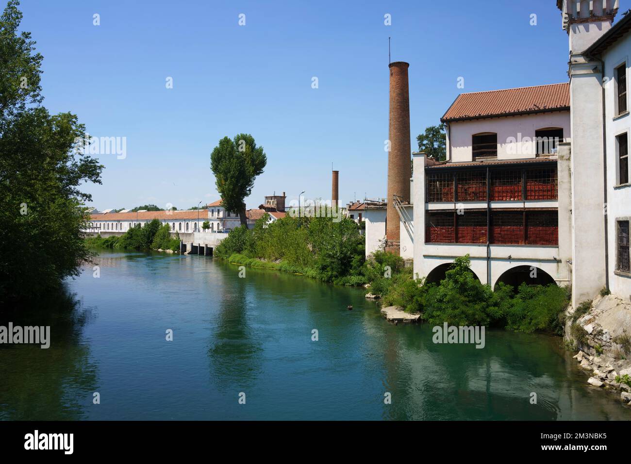 The Oglio river at Pontoglio, in Brescia province, Lombardy, Italy, at summer Stock Photo