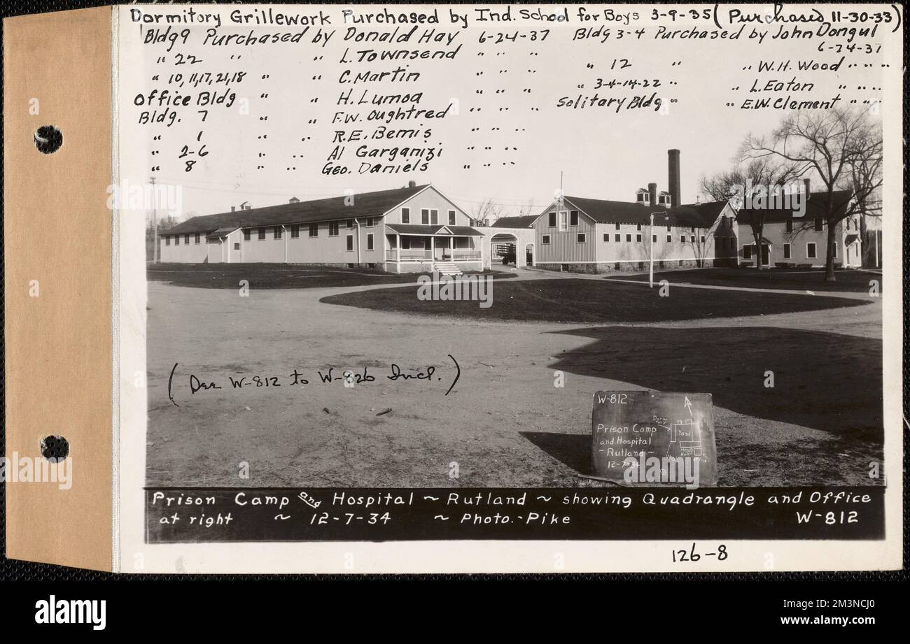 Prison Camp and Hospital, showing quadrangle and office at right, Rutland, Mass., Dec. 7, 1934 : Purchased Nov. 30, 1933, dormitory grillework purchased by Indigent School for Boys Mar. 9, 1935, building 9 purchased by Donald Hay Jun. 24, 1937, building 22 purchased by L. Townsend Jun. 24, 1937, building 10, 11, 17, 21, 18 purchased by C. Martin Jun. 24, 1937, office building purchased by H. Lumoa Jun. 24, 1937, building 7 purchased by F.W. Oughtred Jun. 24, 1937, building 1 purchased by R.E. Bemis Jun. 24, 1937, building 2-6 purchased by Al Garganizi Jun. 24, 1937, building 8 purchased by Geo Stock Photo