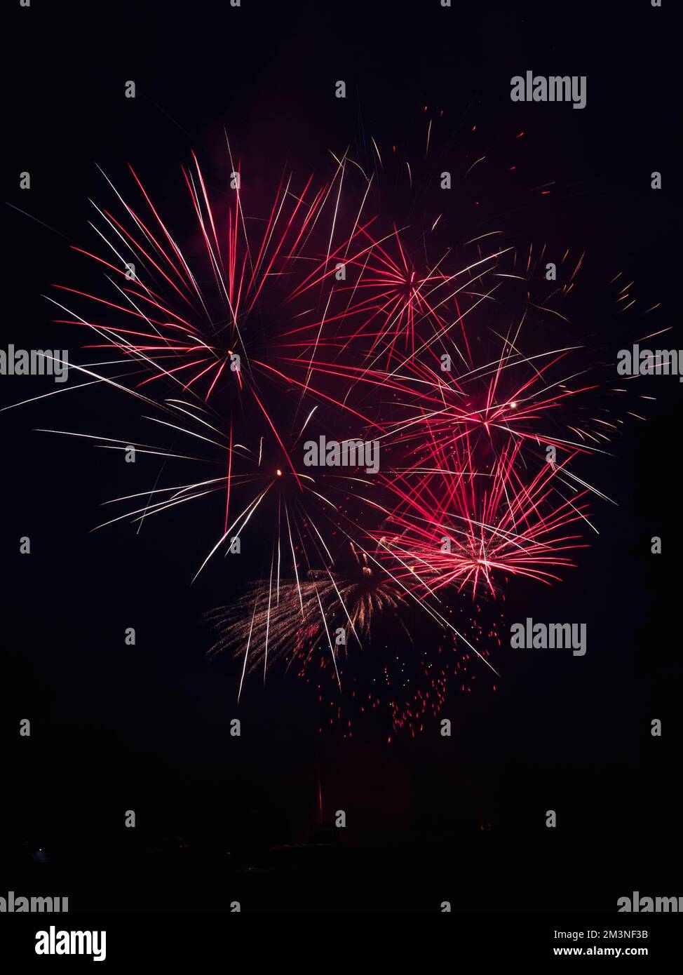 bright vibrant fireworks against a black sky Stock Photo