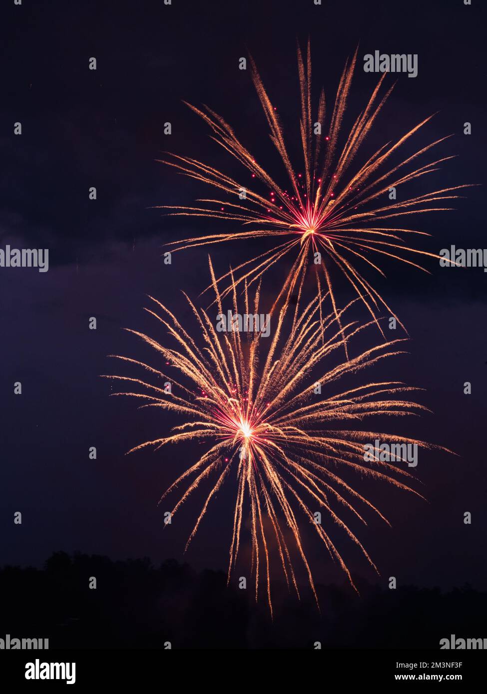 bright vibrant fireworks against a black sky Stock Photo