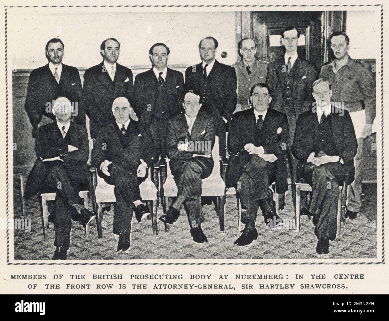 The members of the British prosecuting body at Nuremberg: in the centre of the front row is the attorney-general, Sir Hartley Shawcross. The Nuremberg trials were a series of military tribunals which prosecuted members of the defeated Nazi party. They were held at the Palace of Justice in Nuremberg, Germany, between 1945-1946.     Date: 1945 Stock Photo