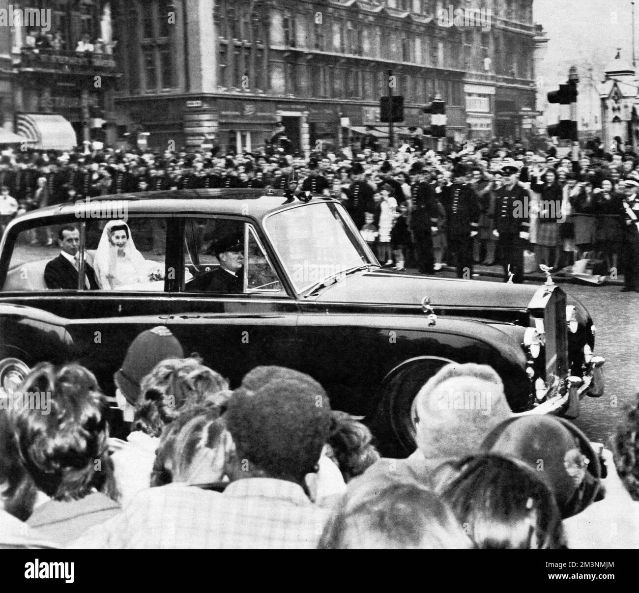 Princess Alexandra of Kent (born 1936), arrives at Westminster Abbey on 24 April 1963 in a smart Rolls Royce for her marriage to the Hon. Angus Ogilvy.  Accompanying her is her elder brother, the Duke of Kent who gave her away.     Date: 1963 Stock Photo