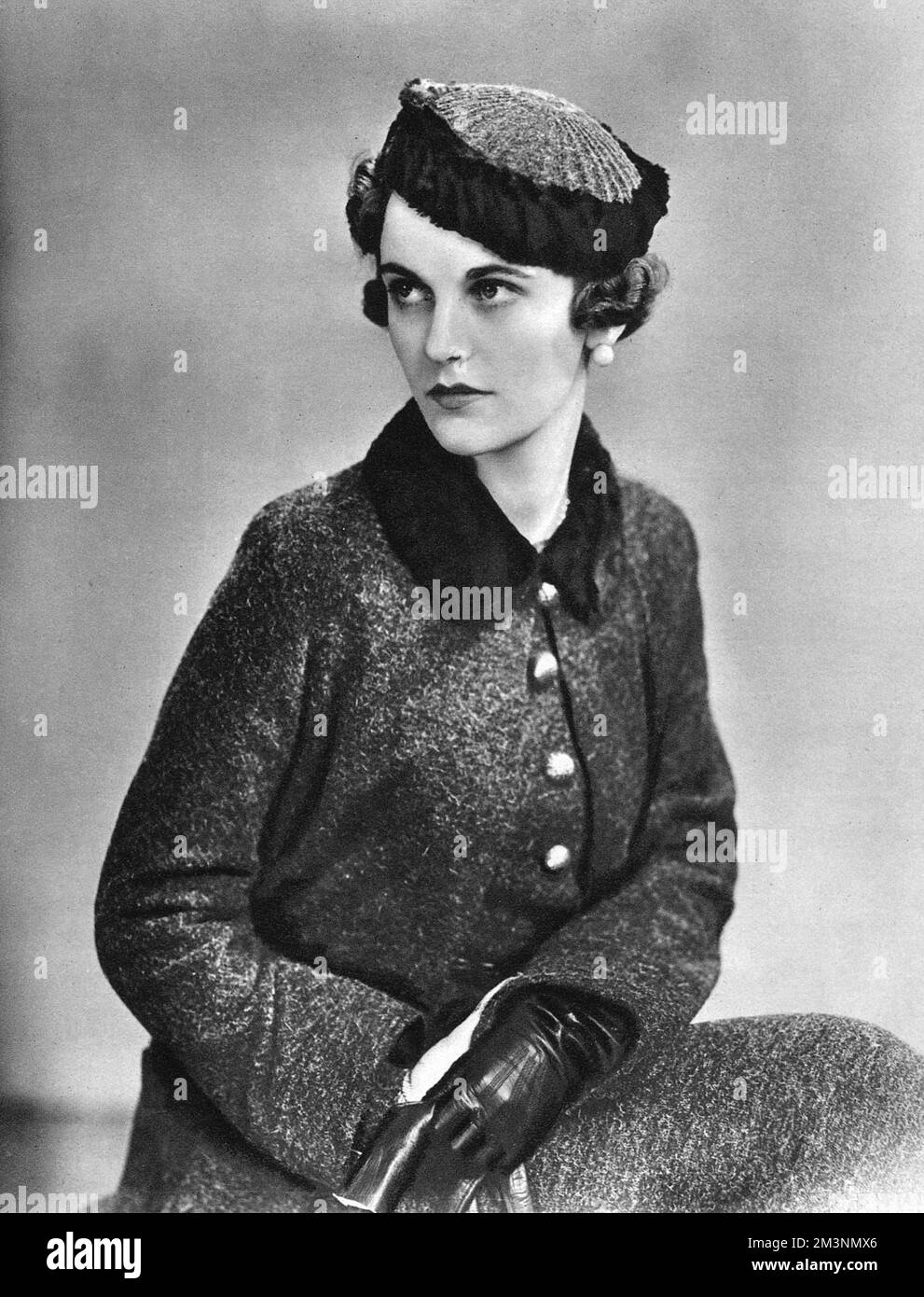 Margaret Whigham (1912 - 1993), British society figure, debutante of the year in 1930. Later Mrs Charles Sweeny, after marrying the American golfer, and then Duchess of Argyll, whose scandalous divorce case, involving the photographs of the 'headless' man plunged her into disgrace and penury. Featured in an exhibition by photographer Peter North called Significant Portraits featuring all the noted society beauties of 1934.     Date: 1934 Stock Photo