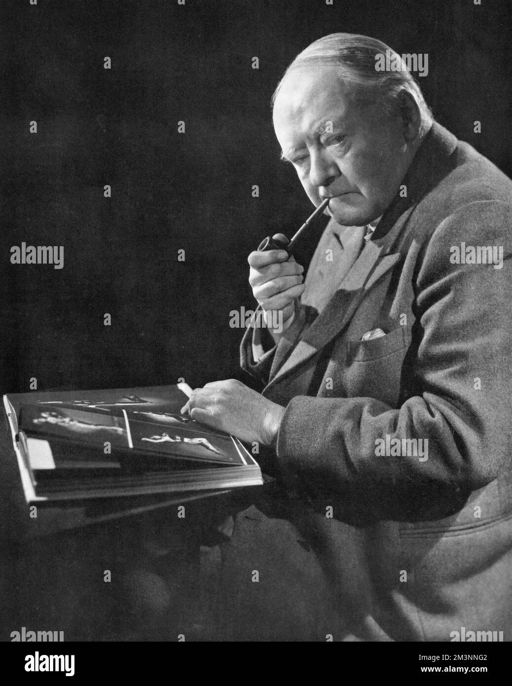 Sir Arnold Bax (1883 - 1953), British composer, who composed a work for mark the Festival of Britain.  His name is particularly associated with a Celtic revival in music.  He wrote 'London Pageant' for the Coronation of George VI in 1937 and was knighted in the same year.       Date: 1951 Stock Photo