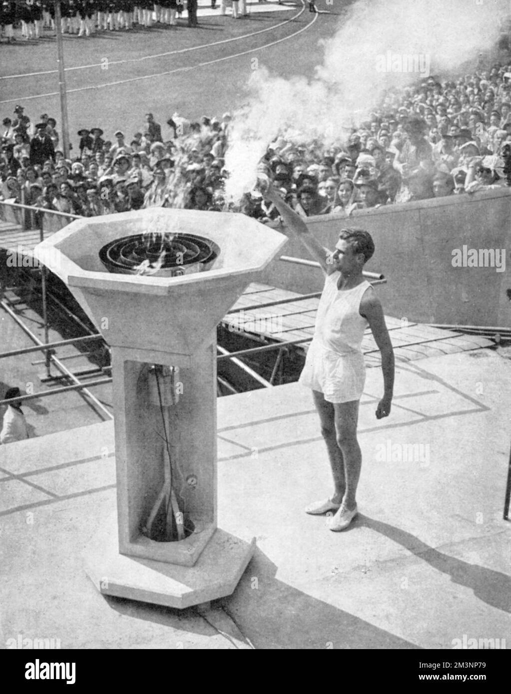 John Mark Lights The Olympic Bowl Opening Ceremony 1948 Stock Photo John Mark Lights The Olympic Bowl Opening Ceremony 1948 Stock Photo