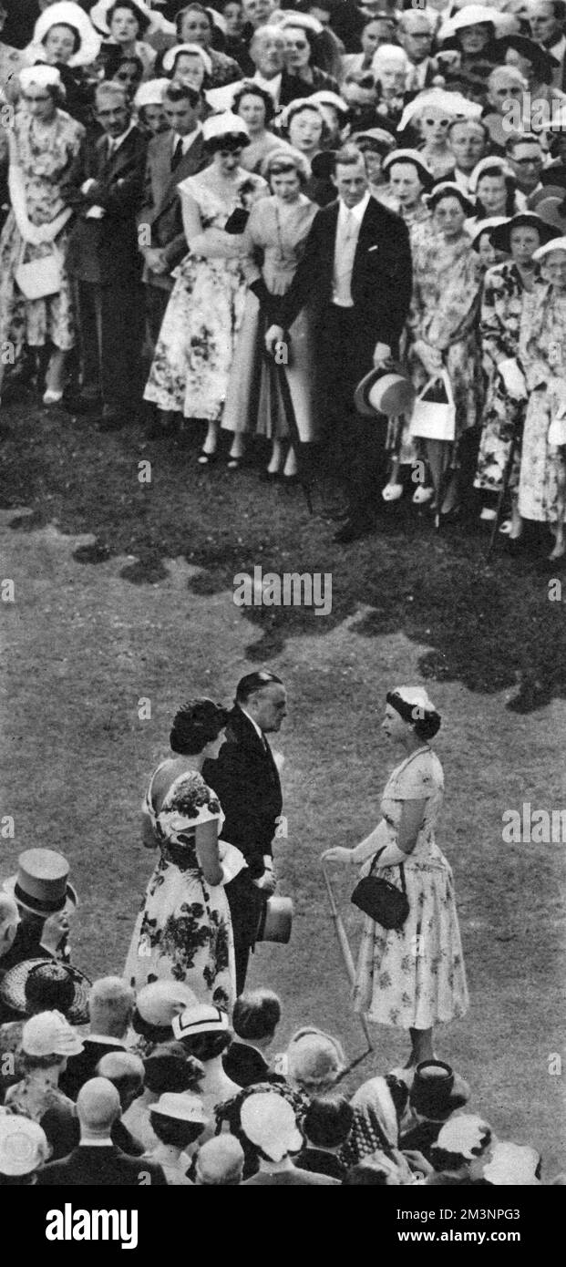 The Queen greets guests at her annual Garden Party.      Date: 1955 Stock Photo