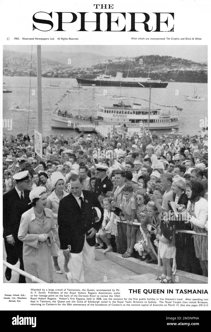 Watched by a large crowd of Tasmanians, the Queen, accompanied by G. F. Sorrell, President of the Royal Hobart Regatta Association, walks to her vantage point on the bank of the Derwent River to review the 125th Regatta.  After spending two days in Tasmania, the Queen and the Duke of Edinburgh sailed in the Royal Yacht Britannia to Sydney.       Date: 1963 Stock Photo