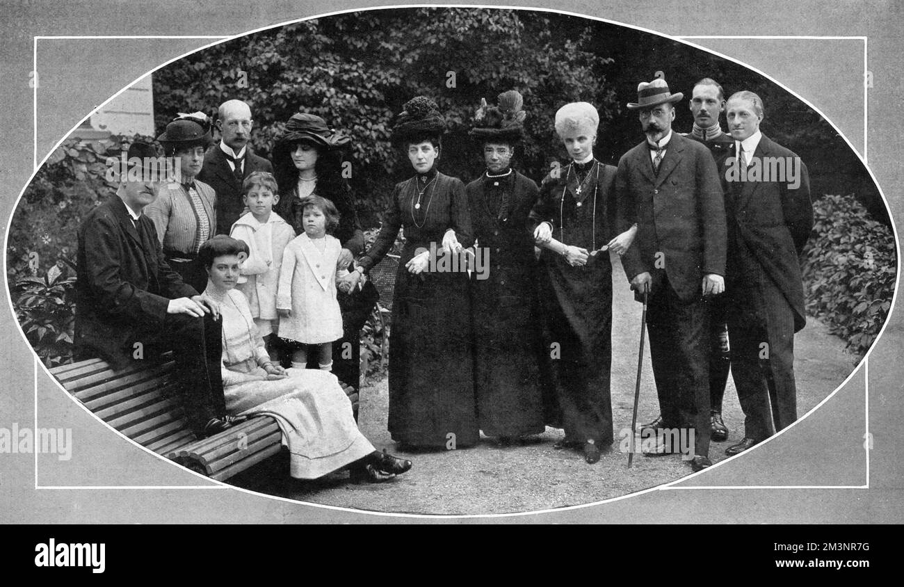 Portrait of Queen Alexandra and her Danish relatives at Bernstorff Castle in Denmark.  From left to right are the Duke of Cumberland, Princess Victoria (Toria), Princess Olga of Cumberland (seated), Prince George of Greece, Princess George of Greece (formerly Princess Marie Bonaparte), in front of whom are standing their children - Prince Petros and Princess Eugenie of Greece - note the broken arm of Prince Petros in a sling - Queen Alexandra, the Empress Marie of Russia (formerly Princess Dagmar of Denmark), the Duchess Thyra of Cumberland, Prince Waldemar of Denmark, his son Prince Aage of D Stock Photo