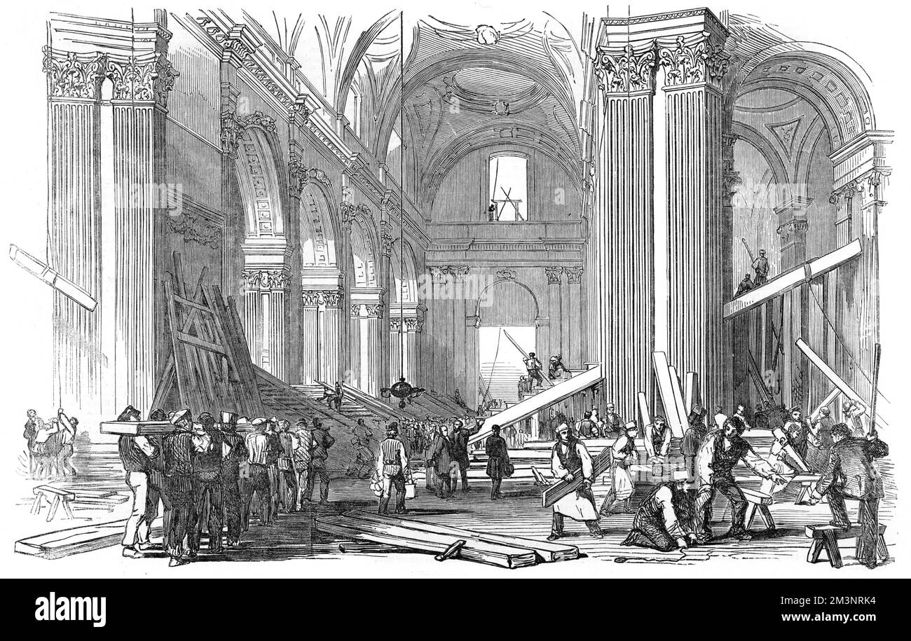 The view of the nave looking west in St Paul's cathedral, as preparations for the funeral of the Duke of Wellington get under way. See picture 10221223 for progress of this construction.     Date: 1852 Stock Photo