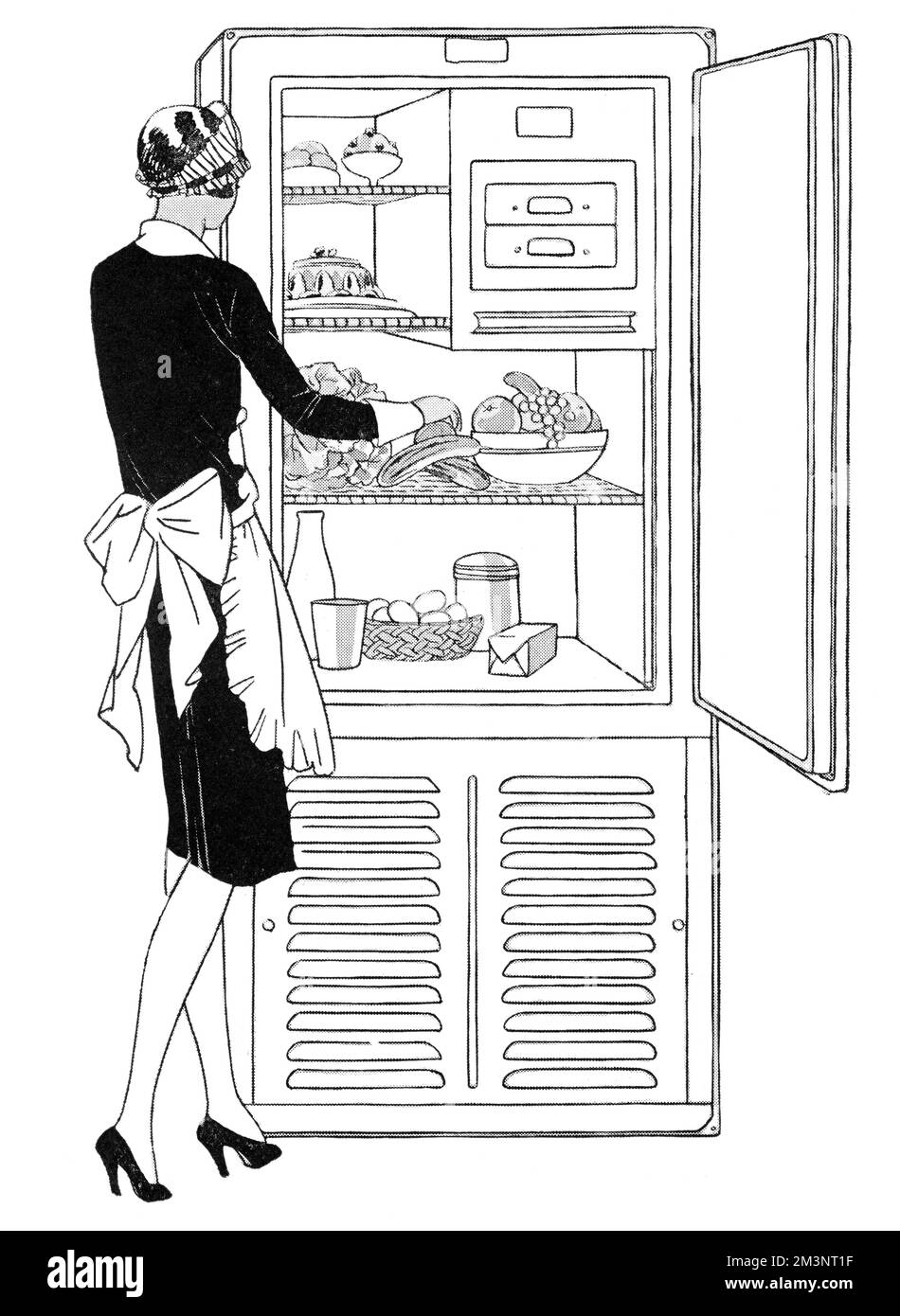 A maid arranging food inside a modern frigidaire, which keeps food fresh and pure through the use of electricity, not ice.  'All the cold required can be obtained from merely a small plug in the wall.'     Date: 1927 Stock Photo