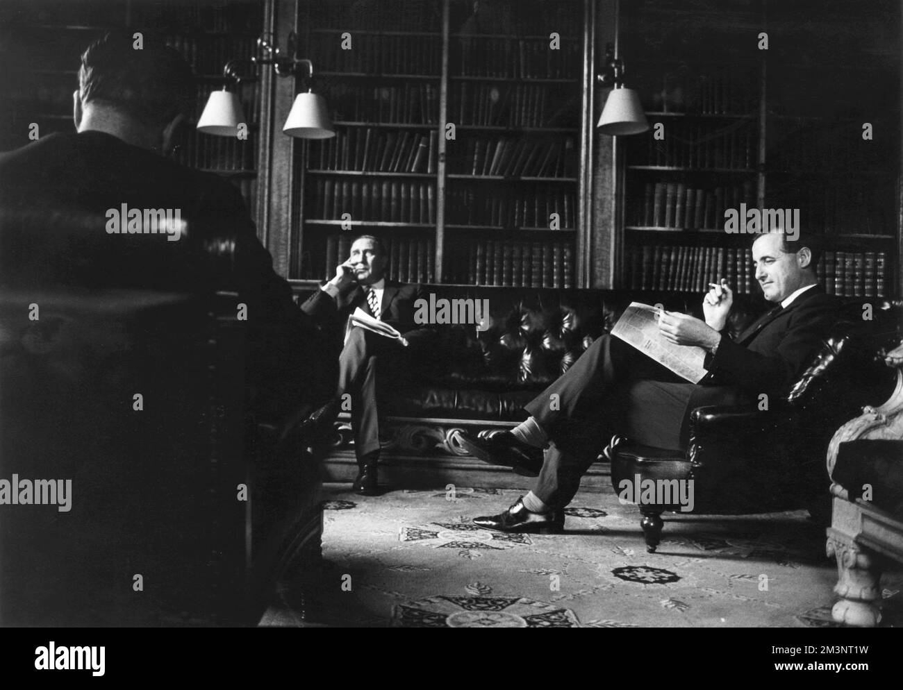 The smoking room of the Reform Club on Pall Mall, London in 1969.  The Reform Club was founded in 1836, in Pall Mall, in the centre of what is often called Londons Clubland.  The founders commissioned a leading architect of the day, Charles Barry, to build an imposing and palatial clubhouse.  It is as splendid today as when it opened in 1841.  Membership was restricted to those who pledged support for the Great Reform Act of 1832, and the many MPs and Whig peers among the early members developed the Club as the political headquarters of the Liberal Party, though the club today has no political Stock Photo