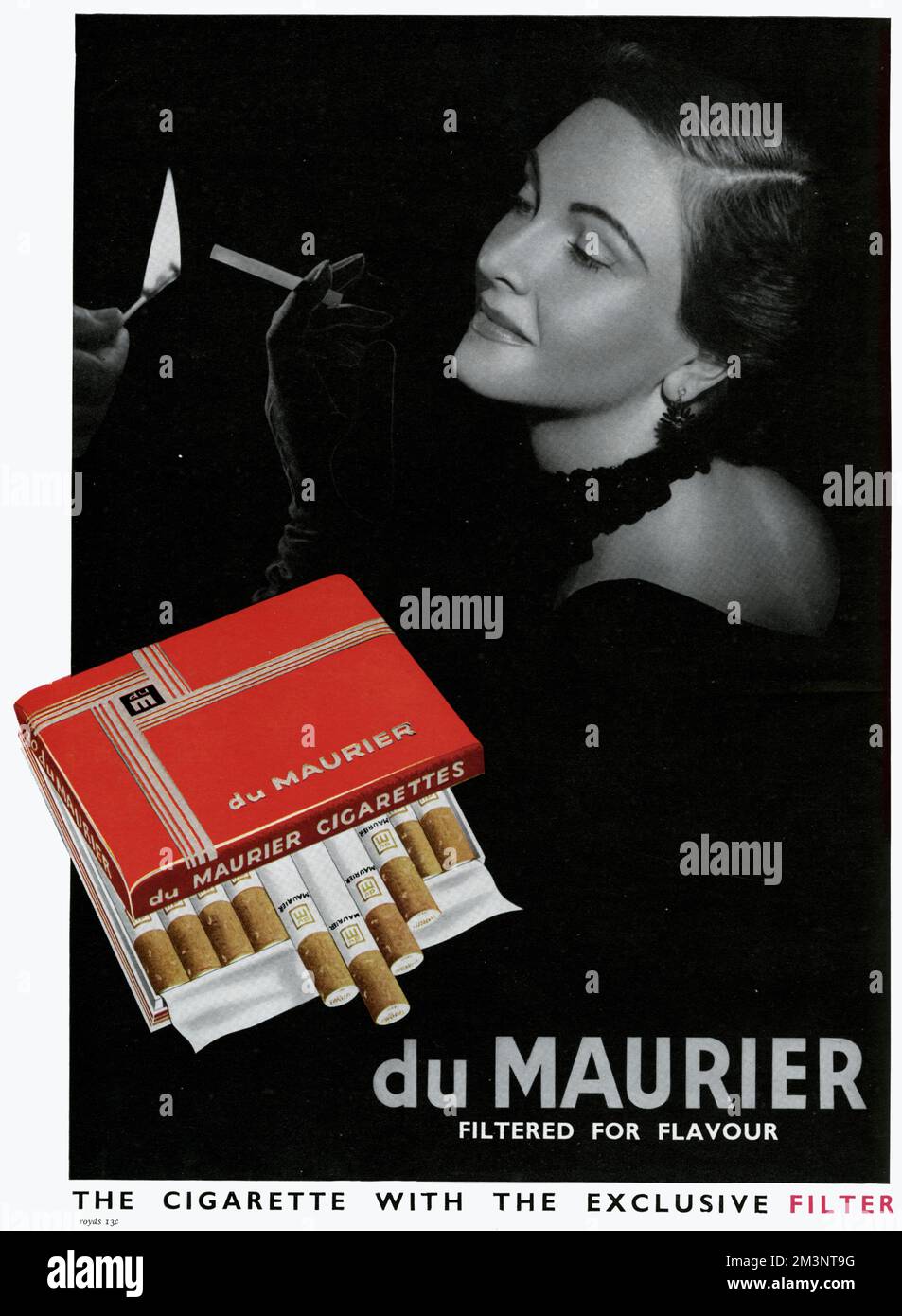 Advertisement for Du Maurier cigarettes, filtered for flavour -- the cigarette with the exclusive filter. Showing an elegant woman in black and white, with an open packet of cigarettes in colour.      Date: 1951 Stock Photo