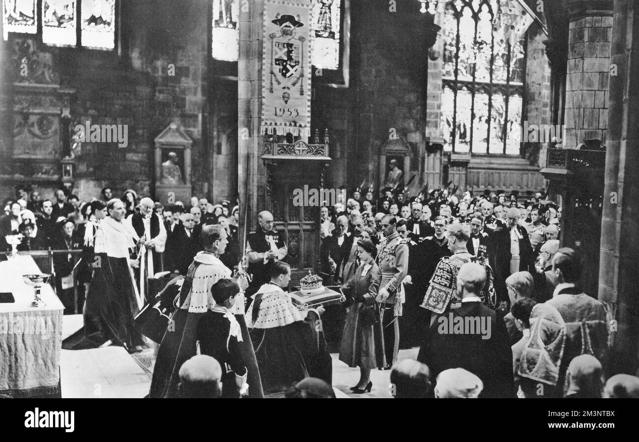 The newly-crowned Queen Elizabeth II, attends the Scottish National Service of Dedication and Thanksgiving at the High Kirk of Edinburgh (St Giles' Cathedral).  The ceremony involved the crown, sceptre and sword to the Queen who accepted it and then presented it back to the Bearer.  The service took place on 24 June, 22 days after the Queen's Coronation.       Date: 1953 Stock Photo