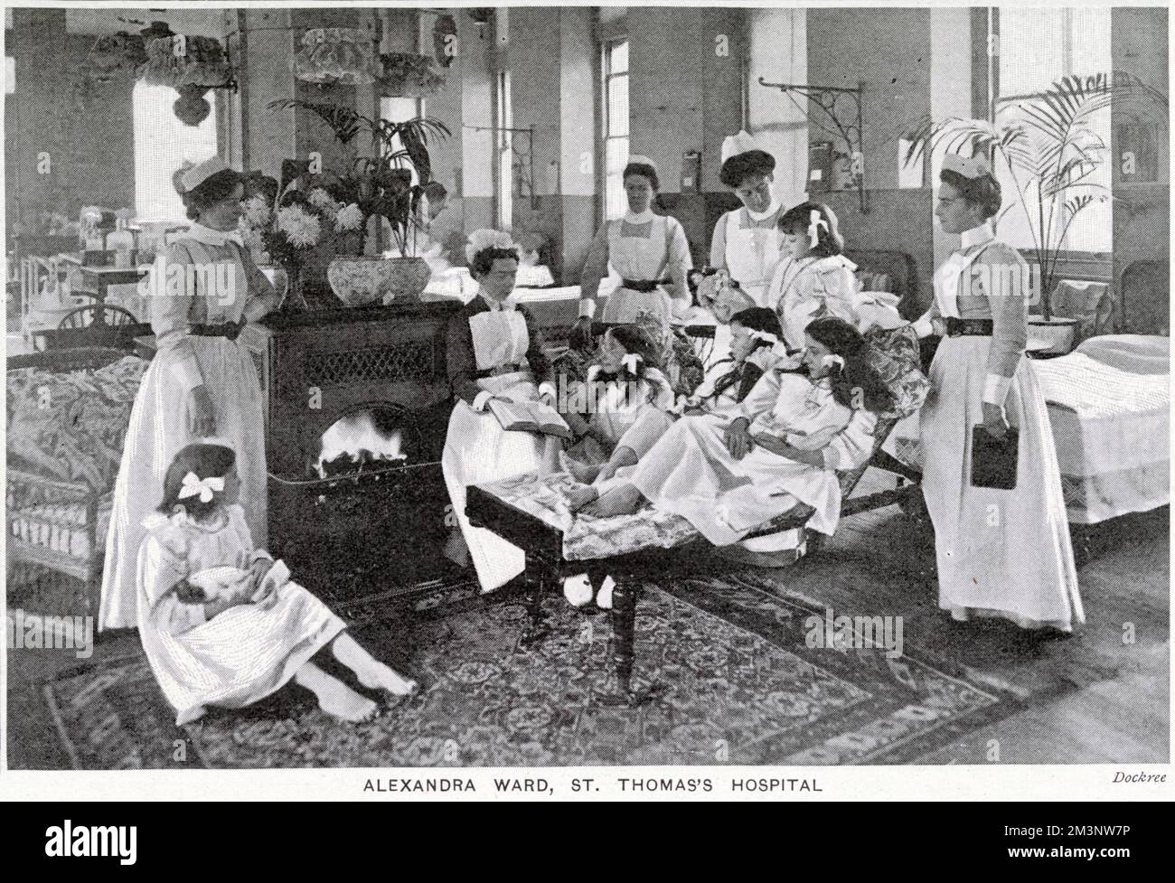 Alexandra Ward, St. Thomas's Hospital, London. Photograph showing a girl's wards with comfortable furnishings. Stock Photo