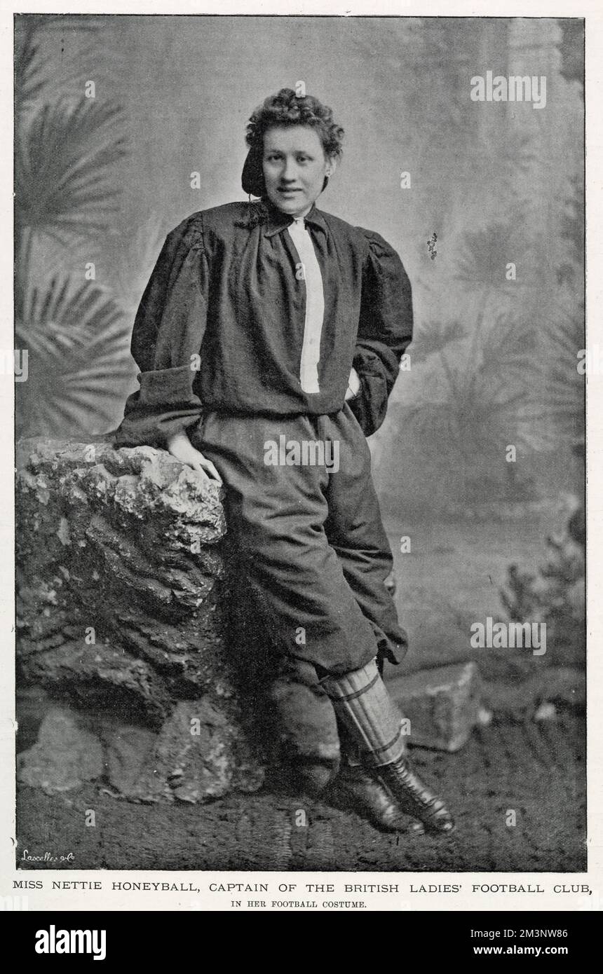 The wonderfully named Miss Nettie J. Honeyball, captain of the British Ladies Football Club, in her football costume(blouse,blue serge knickerbockers,shin pads and football boots) in 1895. Stock Photo